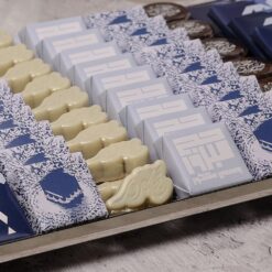 Hajj Mubarak Chocolate Tray Hajj Welcoming Tray 3 • <p data-start="123" data-end="439"><span style="font-family: times-new-roman;">A beautifully arranged silver metal tray featuring <strong>2kg</strong> of assorted decorated chocolates, including a <strong>300g</strong> Father piece and Kaaba-style plexi box. Designed with Hajj-themed wraps and premium white and milk chocolates – perfect for Eid, Hajj celebrations, and heartfelt gifting.</span></p> <span style="font-family: times-new-roman;">Celebrate the blessed return from Hajj with this elegant "<em><strong>Hajj Mabrour</strong></em>" chocolate tray.</span>