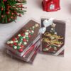 Christmas Milk Chocolate Bar – Festive Plain Milk Chocolate 110g • <span style="font-family: times-new-roman;">Adorable Santa Christmas mug made from high-quality ceramic </span><span style="font-family: times-new-roman;">Includes 150g of festive chocolates for a sweet holiday surprise </span><span style="font-family: times-new-roman;">Ready-to-gift packaging with mesh wrapping and decorative red ribbon </span><span style="font-family: times-new-roman;">Ideal for hot chocolate, coffee, tea, or holiday display </span><span style="font-family: times-new-roman;">Great for Christmas gifting, office exchanges, stocking fillers, and festive décor</span> <span style="font-family: times-new-roman;">Bring warmth, sweetness, and holiday magic to every cup with our Christmas Mug Collection—only from KroKinaChocolate</span>