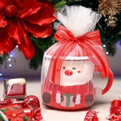 Christmas Mug Gift Set 2 &bull; <span style="font-family: times-new-roman;">Adorable Santa Christmas mug made from high-quality ceramic </span><span style="font-family: times-new-roman;">Includes 150g of festive chocolates for a sweet holiday surprise </span><span style="font-family: times-new-roman;">Ready-to-gift packaging with mesh wrapping and decorative red ribbon </span><span style="font-family: times-new-roman;">Ideal for hot chocolate, coffee, tea, or holiday display </span><span style="font-family: times-new-roman;">Great for Christmas gifting, office exchanges, stocking fillers, and festive décor</span> <span style="font-family: times-new-roman;">Bring warmth, sweetness, and holiday magic to every cup with our Christmas Mug Collection—only from KroKinaChocolate</span>