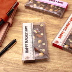 Happy Teachers Day Chocolate Bar Brwon &bull; <p data-start="122" data-end="318"><span style="font-family: times-new-roman;">Celebrate the ones who inspire us every day with a sweet gesture. This rich chocolate bar, topped with crunchy nuts and crafted with care, is the perfect little thank you for an amazing teacher.</span></p> <p data-start="320" data-end="375"><span style="font-family: times-new-roman;">Because every lesson deserves a little sweetness</span></p>