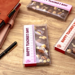 Happy Teachers Day Chocolate Bar Pink &bull; <p data-start="122" data-end="318"><span style="font-family: times-new-roman;">Celebrate the ones who inspire us every day with a sweet gesture. This rich chocolate bar, topped with crunchy nuts and crafted with care, is the perfect little thank you for an amazing teacher.</span></p> <p data-start="320" data-end="375"><span style="font-family: times-new-roman;">Because every lesson deserves a little sweetness</span></p>