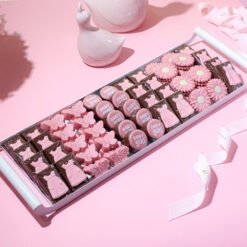 Baby Girl Deluxe Chocolate Tray – 1.6kg &bull; <span style="font-family: times-new-roman;">Celebrate the arrival of your little princess with our <strong data-start="795" data-end="838">Baby Girl Deluxe Chocolate Tray (1.6kg or 1kg)</strong>.</span> <span style="font-family: times-new-roman;">A beautifully arranged selection of handcrafted chocolates in soft pink tones, featuring adorable baby-themed shapes and rich flavors.</span> <span style="font-family: times-new-roman;">Perfect for baby showers, hospital visits, and special gifting moments.</span>